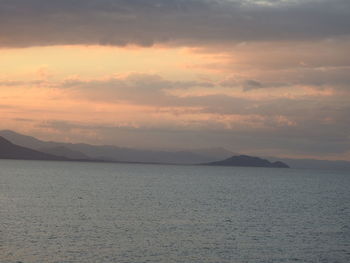 Scenic view of sea against sky at sunset