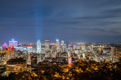 Illuminated buildings in city at night