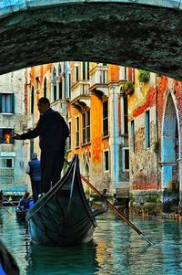 Woman standing in canal