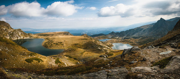 Panoramic view of lake and mountains against sky