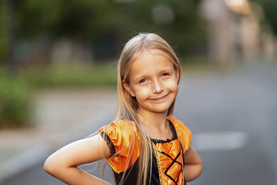 Portrait of smiling girl outdoors