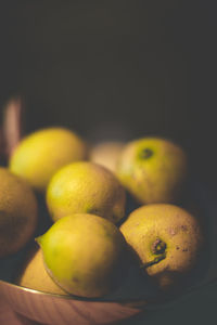 High angle view of lemons in container