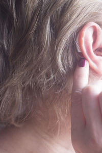 Close-up of woman with hands