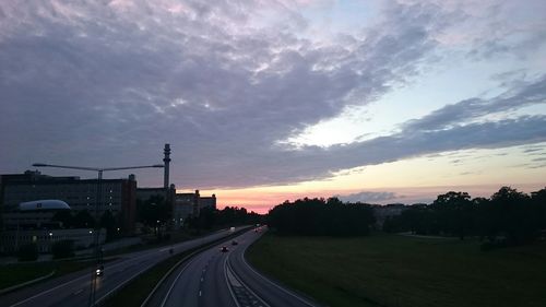 View of road against cloudy sky