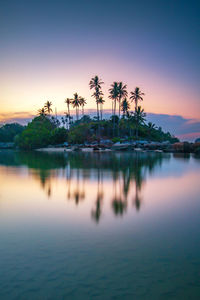 Scenic view of sea against sky at sunset