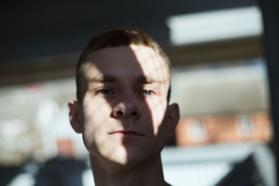 Portrait of man standing outdoors