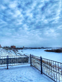 Scenic view of sea against sky during winter