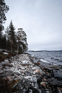 Scenic view of rocks against sky during winter