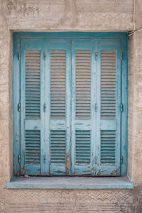 Closed window of old building