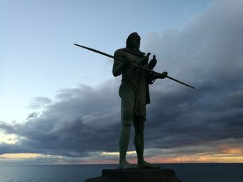 Full length of man standing against sky