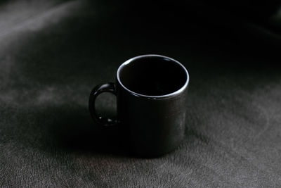 Close-up of coffee cup on table