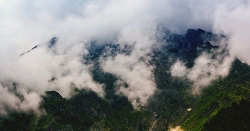 Aerial view of mountains against sky