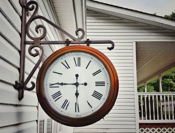 Low angle view of outdoor clock