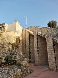 Old building against clear blue sky