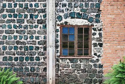 Window on wall of old building