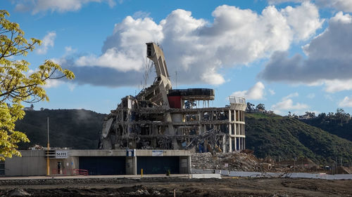 Panoramic shot of construction site against sky