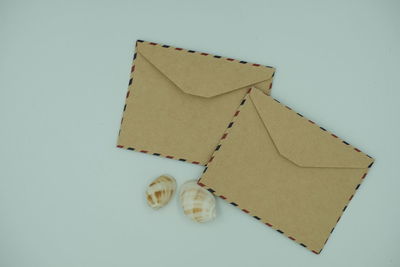 High angle view of paper against white background