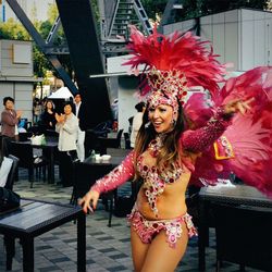 Samba dancer dancing in cafe