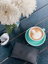 High angle view of cappuccino on table