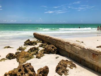 Scenic view of beach against sky