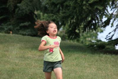 Girl standing on field