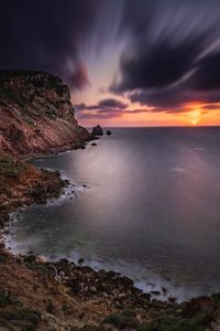 Scenic view of sea against sky during sunset