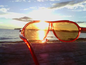 Scenic view of sea at sunset