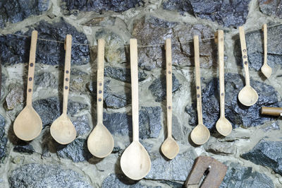 High angle view of decoration hanging on wood