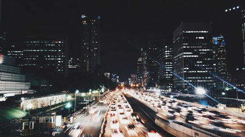 High angle view of light trails on city street