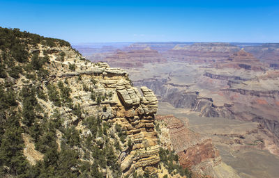 Aerial view of rock formations against sky