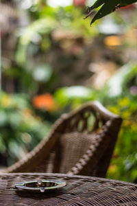Close-up of empty bench on table