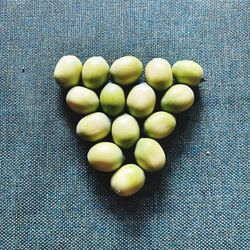 High angle view of green fruits on table