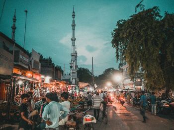 People on street at dusk