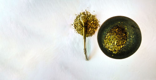 High angle view of lemon on table against white background