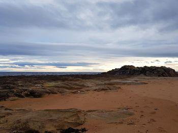 Scenic view of beach against sky