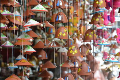 Multi colored ceramics for sale at market stall