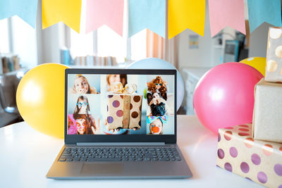 Low angle view of balloons on table