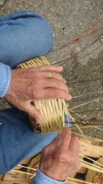 Cropped image of person on wood