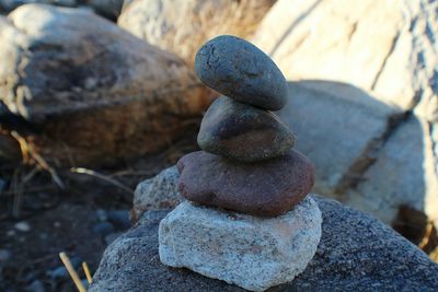 Close-up of stone stack on rock