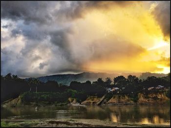 Scenic view of landscape against sky during sunset