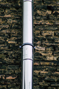 Close-up of pipe on wall