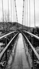 View of suspension bridge against sky