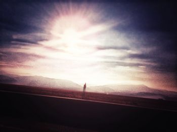 Scenic view of landscape against sky during sunset