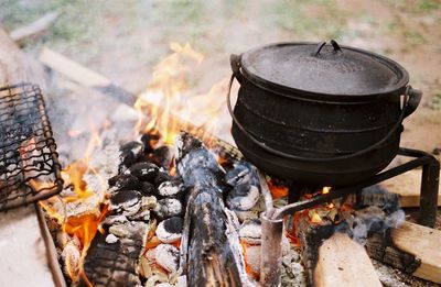 Wood burning stove on field