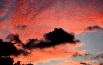 Low angle view of dramatic sky during sunset