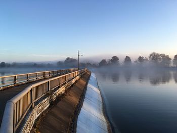 Scenic view of river against clear sky