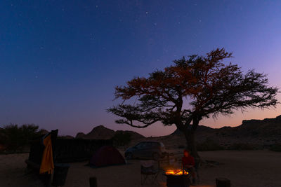 Scenic view of moon against clear sky at night