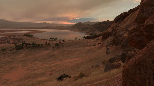 Scenic view of landscape against sky during sunset