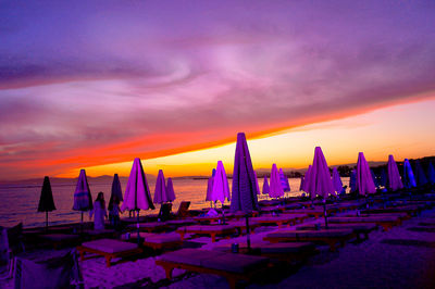 Panoramic view of beach against sky during sunset