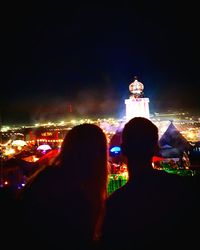 Illuminated cityscape at night